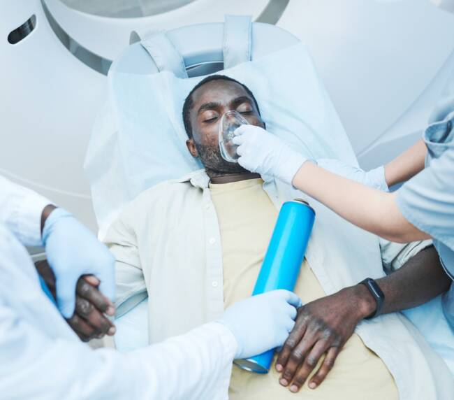 Giving oxygen to Black patient